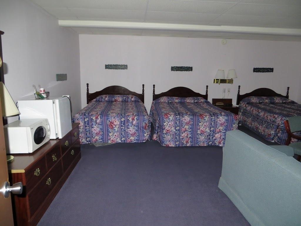 The Bluffs Inn & Suites דקורה חדר תמונה